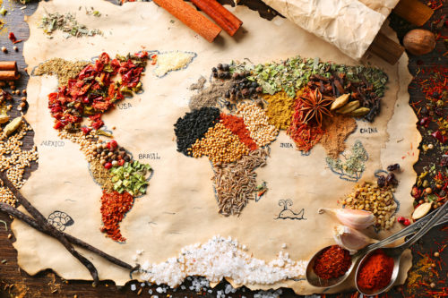 Map of world made from different kinds of spices on wooden background Map of world made from different kinds of spices on wooden background